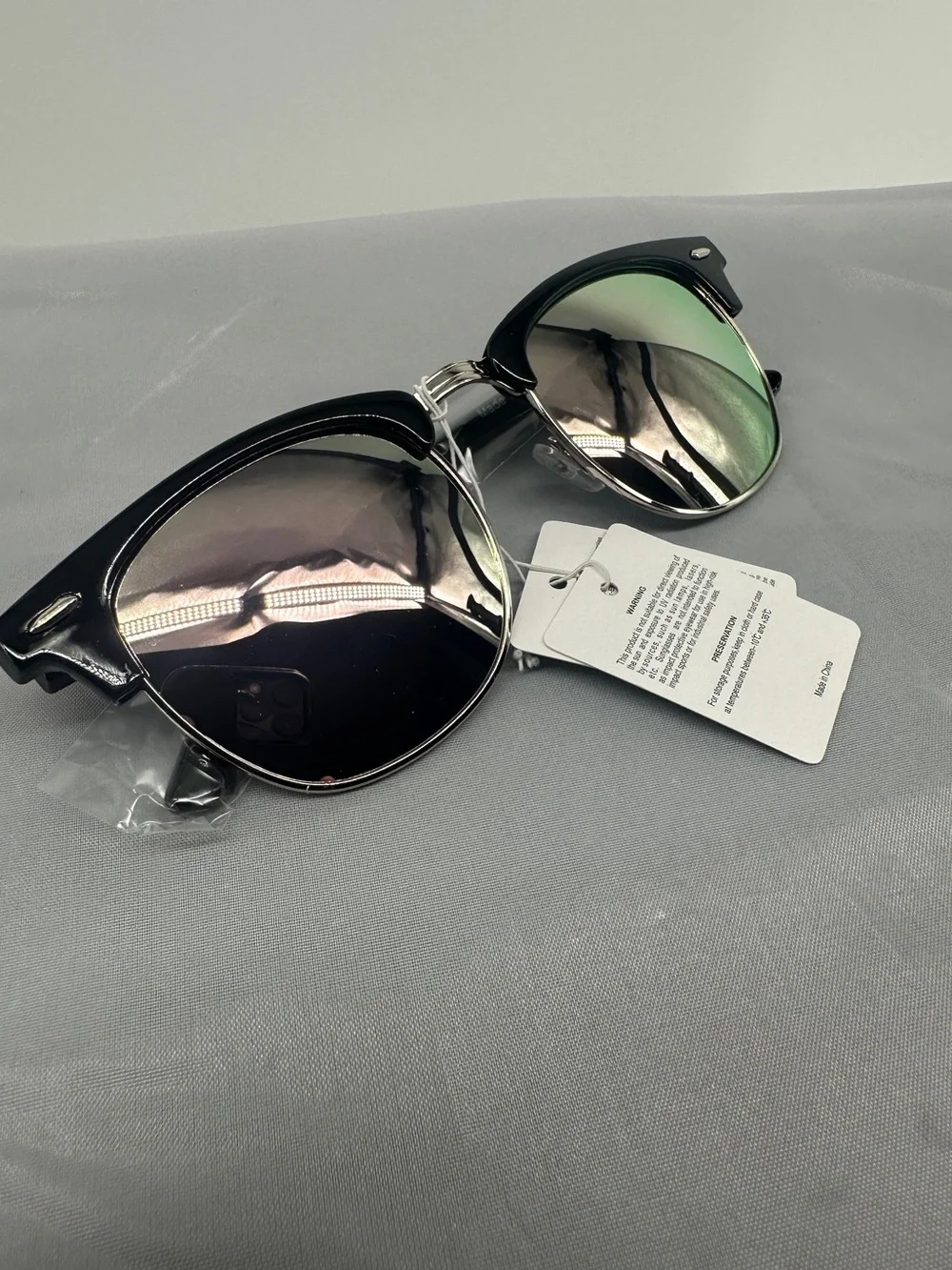 Black clubmaster sunglasses with mirrored lenses